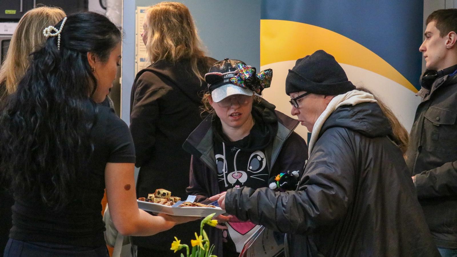 The Station Cafe customers enjoying free food samples