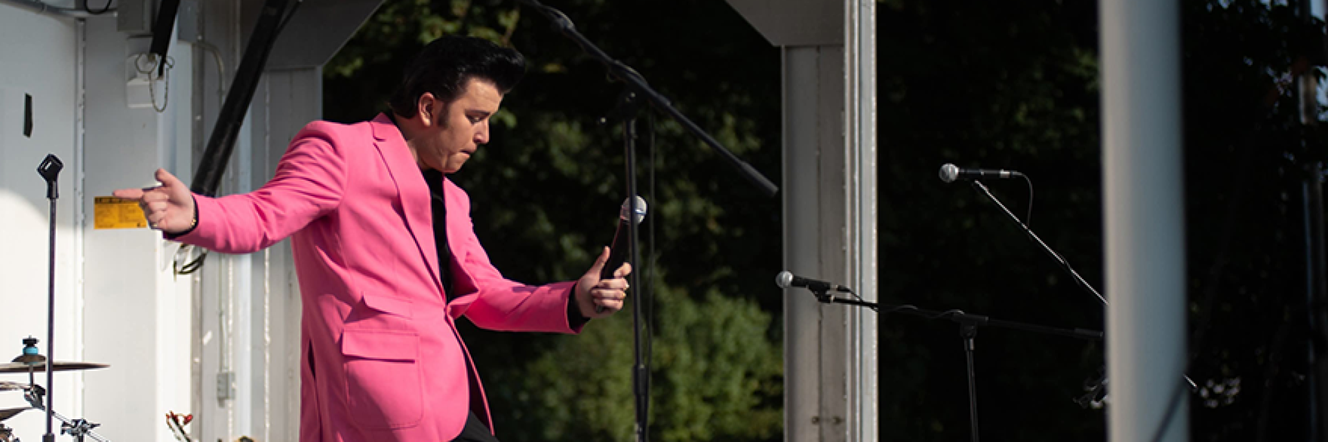 Singer performer on a stage.