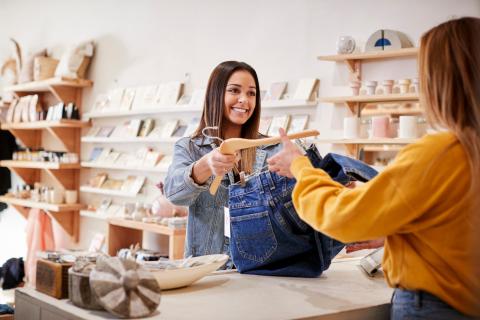 person checking out at retail clothing shop