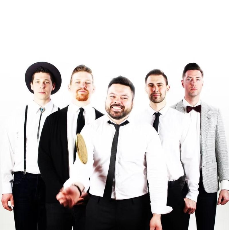 Five men standing wearing suits; member of the band Best Night Ever